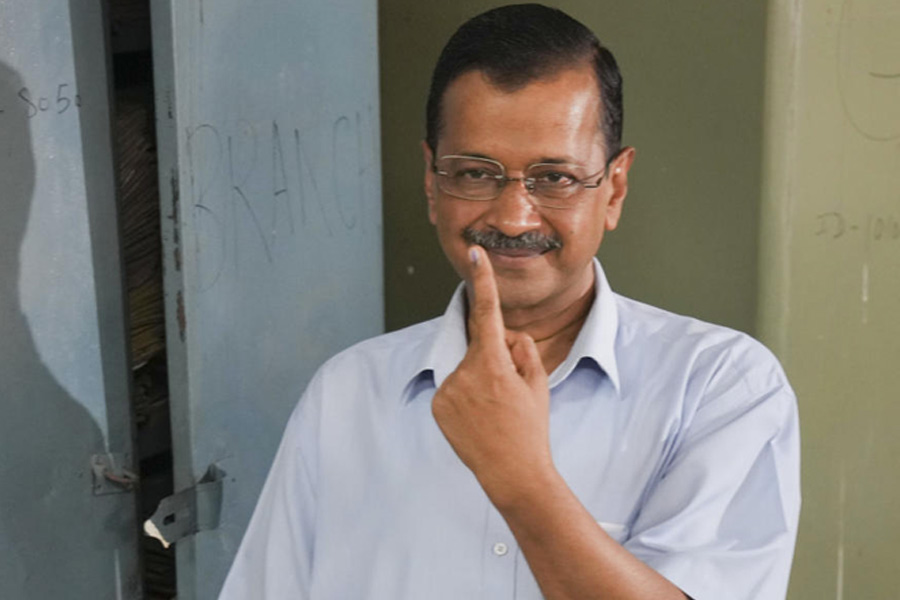 Delhi CM Arvind Kejriwal casts ballot along with family members.